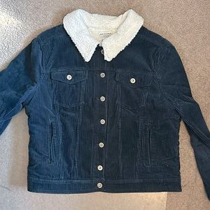 Blue corduroy trucker jacket with pile lining